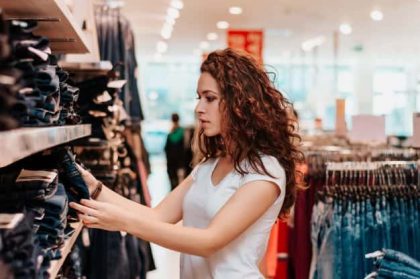 young-girl-shop-buying-clothes_109710-246